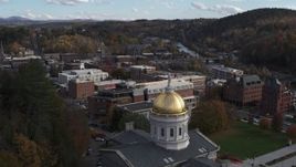 5.7K aerial stock footage fly away from brick buildings to reveal the Vermont State House in Montpelier Aerial Stock Footage | DX0002_219_008