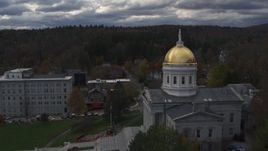 5.7K aerial stock footage reverse view of the golden dome and front steps of the capitol building, Montpelier, Vermont Aerial Stock Footage | DX0002_219_023