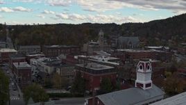 5.7K aerial stock footage reveal and focus on Asiana House in downtown, Montpelier, Vermont Aerial Stock Footage | DX0002_219_041