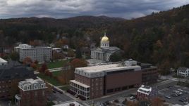 5.7K aerial stock footage of a reverse view of the capitol building and buildings around the grounds, Montpelier, Vermont Aerial Stock Footage | DX0002_219_053