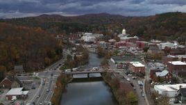 5.7K aerial stock footage follow the Winooski River toward bridge at sunset, Montpelier, Vermont Aerial Stock Footage | DX0002_220_001