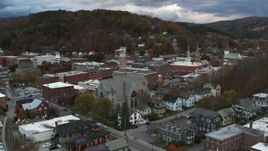 5.7K aerial stock footage of circling city hall and brick buildings at sunset, Montpelier, Vermont Aerial Stock Footage | DX0002_220_008