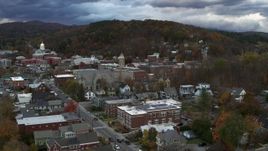 5.7K aerial stock footage of a reverse view and orbit of city hall and brick buildings at sunset, Montpelier, Vermont Aerial Stock Footage | DX0002_220_009