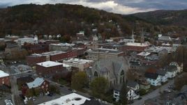 5.7K aerial stock footage approach and orbit city hall and brick buildings at sunset, Montpelier, Vermont Aerial Stock Footage | DX0002_220_012