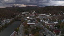 5.7K aerial stock footage focus on the state capitol at sunset while flying by the river, Montpelier, Vermont Aerial Stock Footage | DX0002_220_021