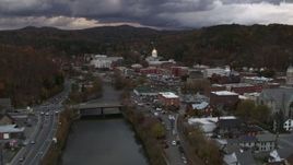 5.7K aerial stock footage of the state capitol at sunset while following the river, Montpelier, Vermont Aerial Stock Footage | DX0002_220_022