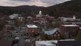5.7K aerial stock footage a view of the capitol dome at sunset during descent, Montpelier, Vermont Aerial Stock Footage | DX0002_220_029