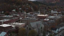 5.7K aerial stock footage of passing by a church and city hall at sunset, Montpelier, Vermont Aerial Stock Footage | DX0002_220_033