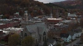 5.7K aerial stock footage of descend and flyby church and city hall at sunset, Montpelier, Vermont Aerial Stock Footage | DX0002_220_034