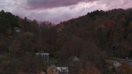 5.7K aerial stock footage of hills with colorful trees at sunset, seen during descent, Montpelier, Vermont Aerial Stock Footage | DX0002_220_044