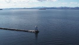 5.7K aerial stock footage descend and orbit a lighthouse on Lake Champlain, Burlington, Vermont Aerial Stock Footage | DX0002_222_010