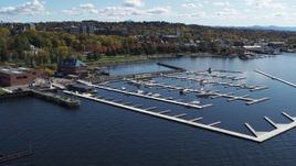 5.7K aerial stock footage fly away from and orbit a marina on Lake Champlain, Burlington, Vermont Aerial Stock Footage | DX0002_222_014