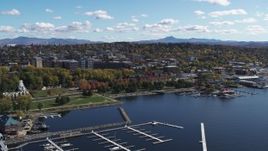 5.7K aerial stock footage fly away from downtown, reveal marina on Lake Champlain, Burlington, Vermont Aerial Stock Footage | DX0002_222_019