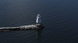 5.7K aerial stock footage of ascending around a lighthouse on Lake Champlain, Burlington, Vermont Aerial Stock Footage | DX0002_222_029