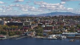 5.7K aerial stock footage descend and flyby city buildings in downtown, Burlington, Vermont Aerial Stock Footage | DX0002_222_033