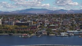 5.7K aerial stock footage of a stationary view of city buildings in downtown, seen from the lake, Burlington, Vermont Aerial Stock Footage | DX0002_222_039