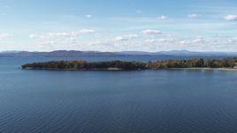 5.7K aerial stock footage of passing by waterfront homes on Appletree Point by Lake Champlain, Burlington, Vermont Aerial Stock Footage | DX0002_223_013