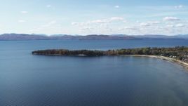 5.7K aerial stock footage of flying by lakefront homes on Appletree Point by Lake Champlain, Burlington, Vermont Aerial Stock Footage | DX0002_223_015