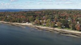 5.7K aerial stock footage of an orbit of beachfront homes on the shore of Lake Champlain, Burlington, Vermont Aerial Stock Footage | DX0002_223_019