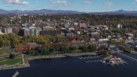 5.7K aerial stock footage orbit downtown buildings, park and marina, Burlington, Vermont Aerial Stock Footage | DX0002_224_005