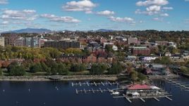 5.7K aerial stock footage of downtown buildings behind a marina and Waterfront Park, Burlington, Vermont Aerial Stock Footage | DX0002_224_008