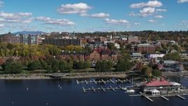 5.7K aerial stock footage of downtown buildings behind Waterfront Park and a marina, Burlington, Vermont Aerial Stock Footage | DX0002_224_009