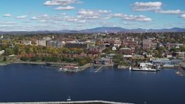 5.7K aerial stock footage wide orbit of downtown buildings, seen from breakwaters, Burlington, Vermont Aerial Stock Footage | DX0002_224_012