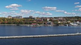 5.7K aerial stock footage fly low over breakwaters toward downtown, Burlington, Vermont Aerial Stock Footage | DX0002_224_015
