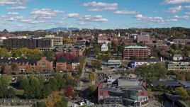 5.7K aerial stock footage of city buildings and College Street seen during descent, Burlington, Vermont Aerial Stock Footage | DX0002_224_017