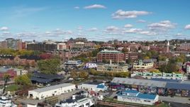 5.7K aerial stock footage of buildings in downtown seen from marina, Burlington, Vermont Aerial Stock Footage | DX0002_224_023