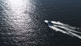 5.7K aerial stock footage of tracking a speedboat racing across Lake Champlain near Burlington, Vermont Aerial Stock Footage | DX0002_224_025