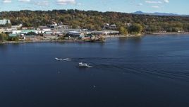 5.7K aerial stock footage of a speedboat passing a boat on Lake Champlain near Burlington, Vermont Aerial Stock Footage | DX0002_224_029