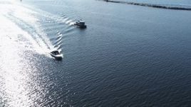 5.7K aerial stock footage orbit a speedboat near another boat on Lake Champlain near Burlington, Vermont Aerial Stock Footage | DX0002_224_030