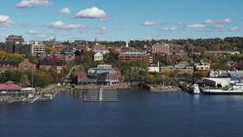 5.7K aerial stock footage orbit office building in downtown, seen from a marina, Burlington, Vermont Aerial Stock Footage | DX0002_224_034