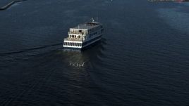 5.7K aerial stock footage descend and orbit a ferry on Lake Champlain, Burlington, Vermont Aerial Stock Footage | DX0002_224_044