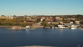 5.7K aerial stock footage of orbiting city buildings near marinas, seen from breakwater, Burlington, Vermont Aerial Stock Footage | DX0002_224_059