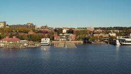 5.7K aerial stock footage of approach a marina and city buildings in downtown, Burlington, Vermont Aerial Stock Footage | DX0002_224_062