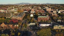 5.7K aerial stock footage ascend over a marina while focused on office buildings in downtown, Burlington, Vermont Aerial Stock Footage | DX0002_224_063