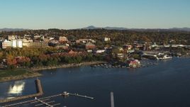 5.7K aerial stock footage slowly orbit downtown buildings, Waterfront Park and Lake Champlain marina, Burlington, Vermont Aerial Stock Footage | DX0002_224_070