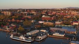 5.7K aerial stock footage orbit buildings in downtown and marina at sunset, Burlington, Vermont Aerial Stock Footage | DX0002_225_011