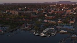 5.7K aerial stock footage an orbit around downtown and two marinas at sunset, Burlington, Vermont Aerial Stock Footage | DX0002_225_022