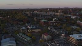 5.7K aerial stock footage descend while focused on downtown office buildings at sunset, Burlington, Vermont Aerial Stock Footage | DX0002_225_024