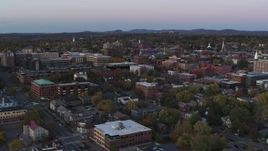 5.7K aerial stock footage reverse view of downtown office buildings at twilight, Burlington, Vermont Aerial Stock Footage | DX0002_225_025