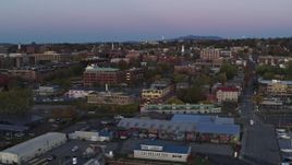 5.7K aerial stock footage of flying by downtown office buildings at twilight, Burlington, Vermont Aerial Stock Footage | DX0002_225_031