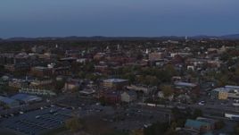 5.7K aerial stock footage slowly ascending toward downtown buildings from the lake at twilight, Burlington, Vermont Aerial Stock Footage | DX0002_225_038