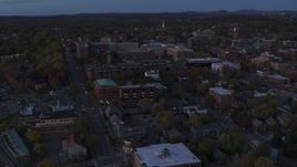 5.7K aerial stock footage circling and flying away from the downtown area at twilight, Burlington, Vermont Aerial Stock Footage | DX0002_225_046