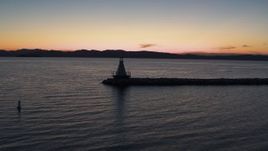 5.7K aerial stock footage of orbiting a Lake Champlain lighthouse at twilight, Burlington, Vermont Aerial Stock Footage | DX0002_226_005