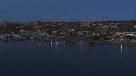 5.7K aerial stock footage fly away from the downtown area at twilight, seen from the lake, Burlington, Vermont Aerial Stock Footage | DX0002_226_008
