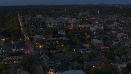 5.7K aerial stock footage circle and fly away from downtown area office buildings at twilight, Burlington, Vermont Aerial Stock Footage | DX0002_226_013