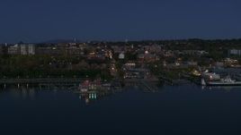 5.7K aerial stock footage of a slow orbit of city's downtown area and marinas at night, Burlington, Vermont Aerial Stock Footage | DX0002_226_017